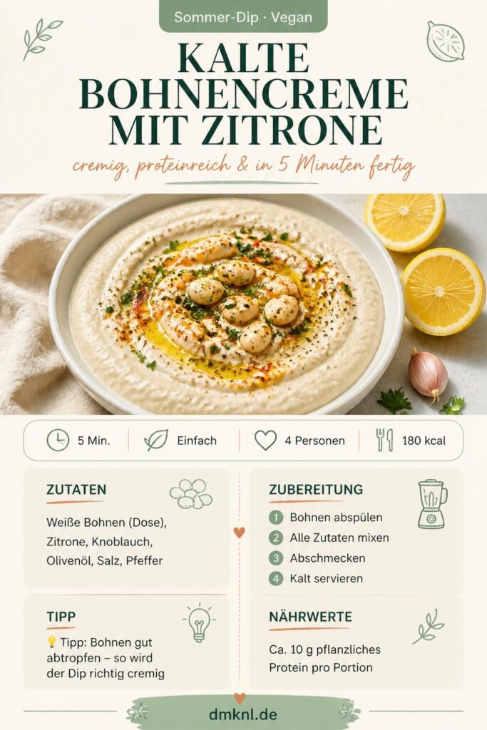 Kalte Bohnencreme mit Zitrone in einer weißen Schüssel, garniert mit Olivenöl und Paprikaflocken